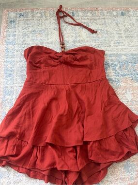Francesca’s Burnt Orange Flowy Romper